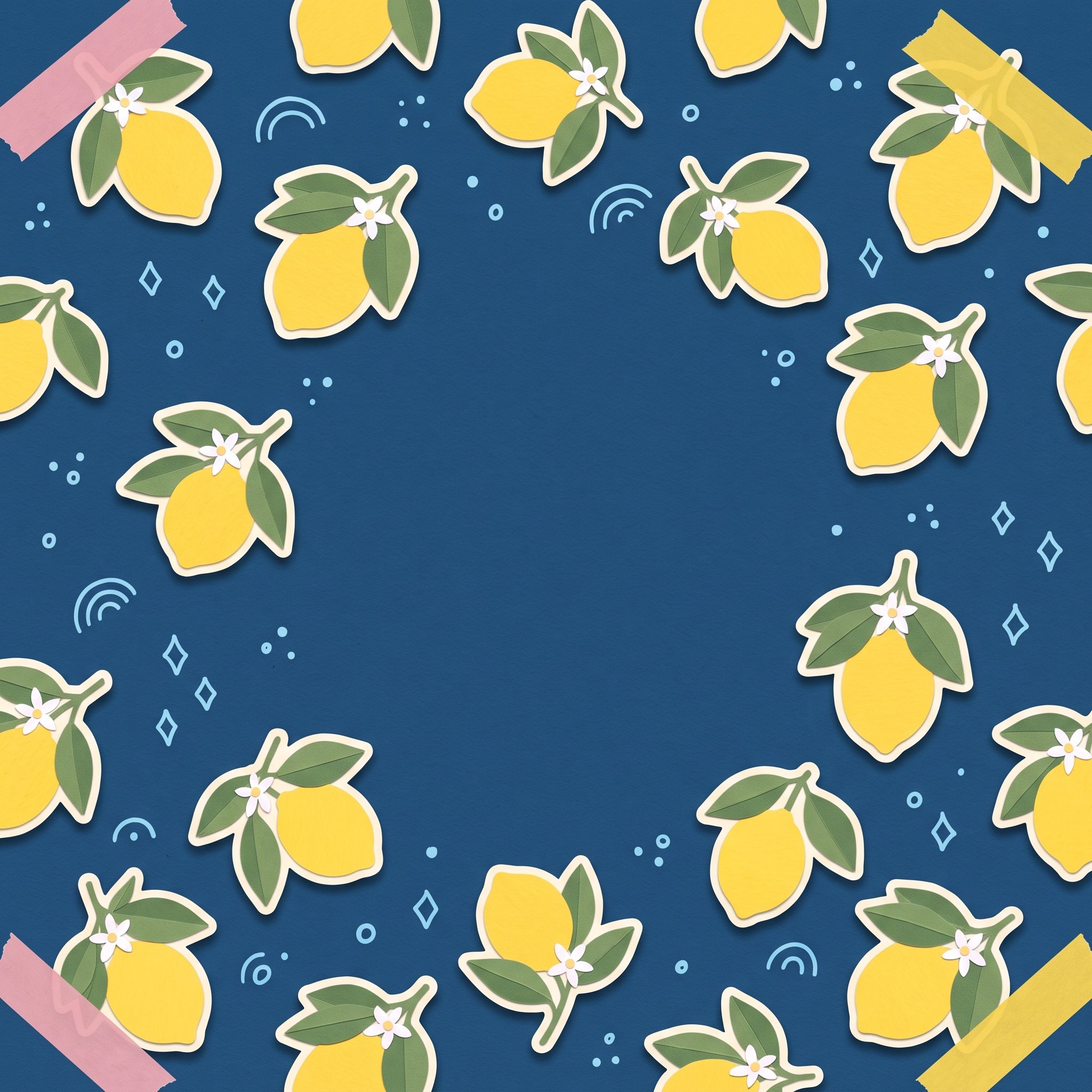 Scrapbook pattern of lemon stickers and doodles on deep navy paper with washi tape corners